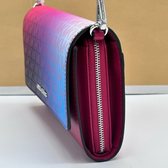 MICHAEL KORS
Jet Set Large Ombré Signature Logo Crossbody Bag Dark Raspberry - Picture 7 of 15